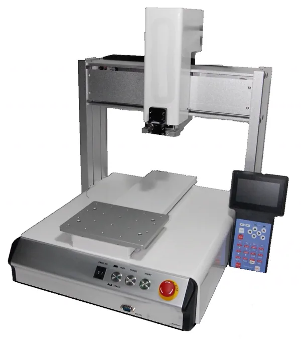 Benchtop XYZ gantry robot with a white work table, front-panel run, purge and start buttons, an emergency stop, and a handheld teach pendant
